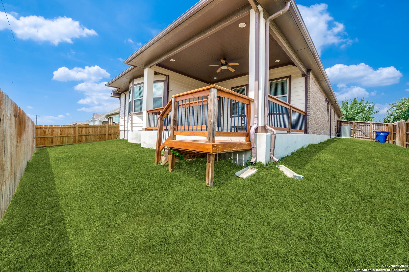 836 Silver Fox Cibolo, TX 78108 - Photo 26 of 26 a yellow and house with a big yard and large trees