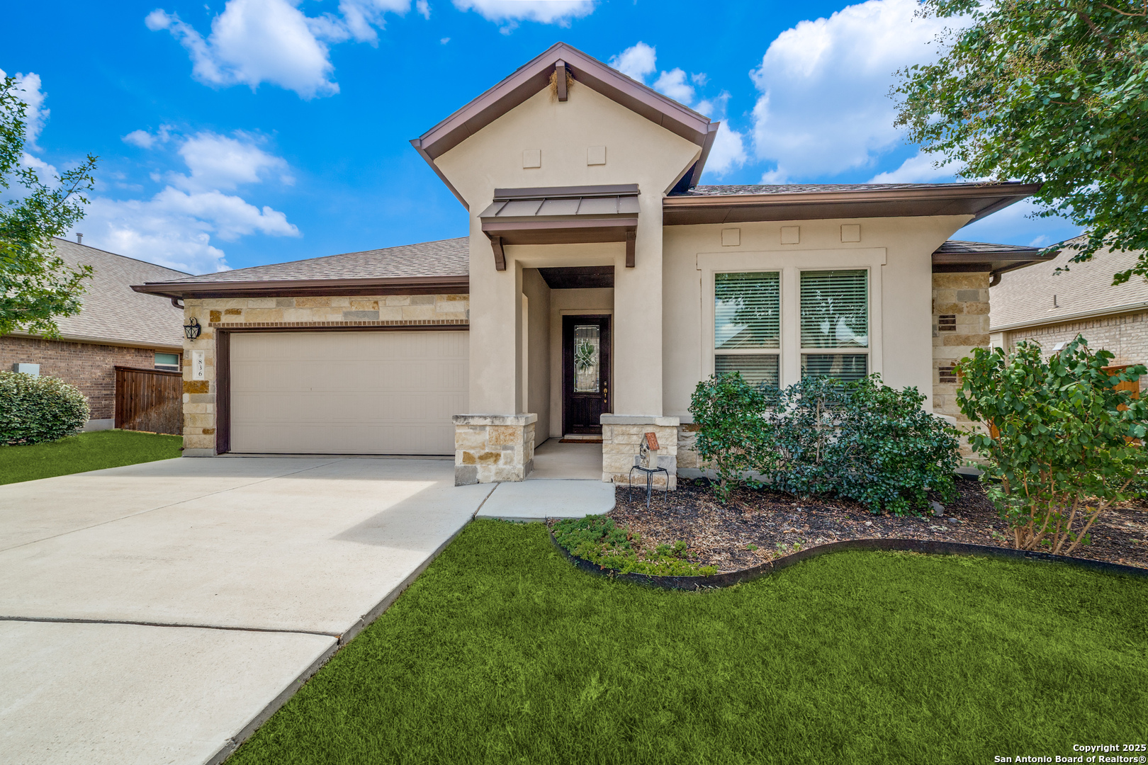 836 Silver Fox Cibolo, TX 78108 - Photo 3 of 26 a front view of a house with a yard and garage