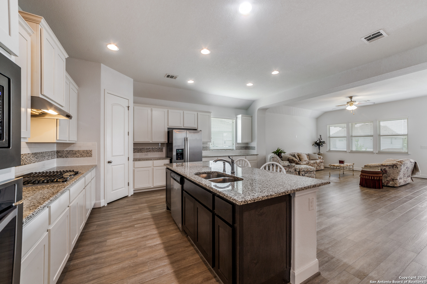 836 Silver Fox Cibolo, TX 78108 - Photo 6 of 26 a kitchen with sink stove and refrigerator