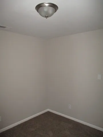 an empty room with a workbench