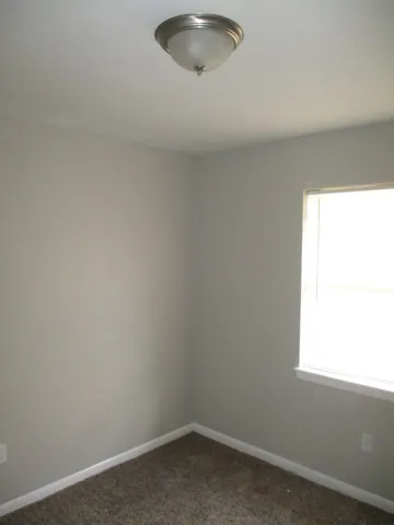 a view of a small space and a window