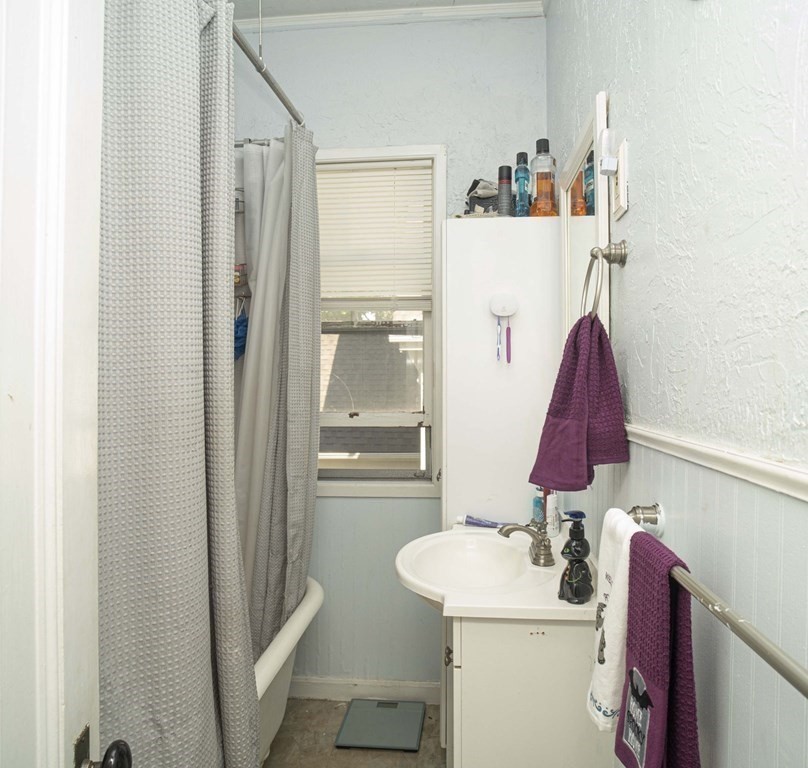 5 Exeter Street Taunton, MA 02780 - Photo 12 of 32 a bathroom with a sink vanity mirror and toilet