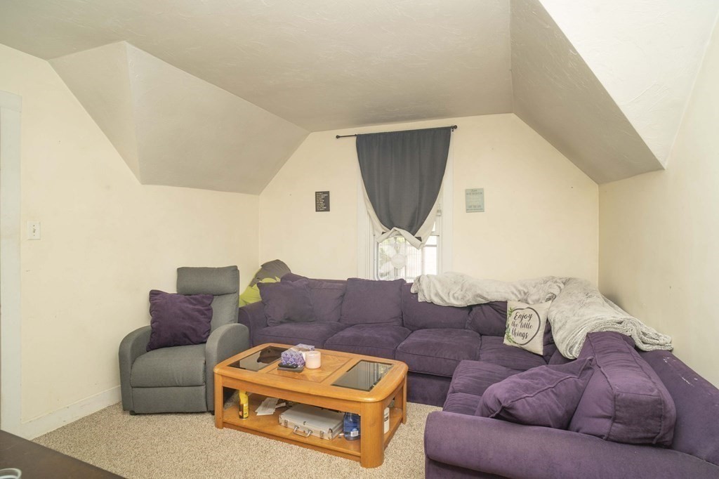 5 Exeter Street Taunton, MA 02780 - Photo 14 of 32 a living room with furniture and a couch