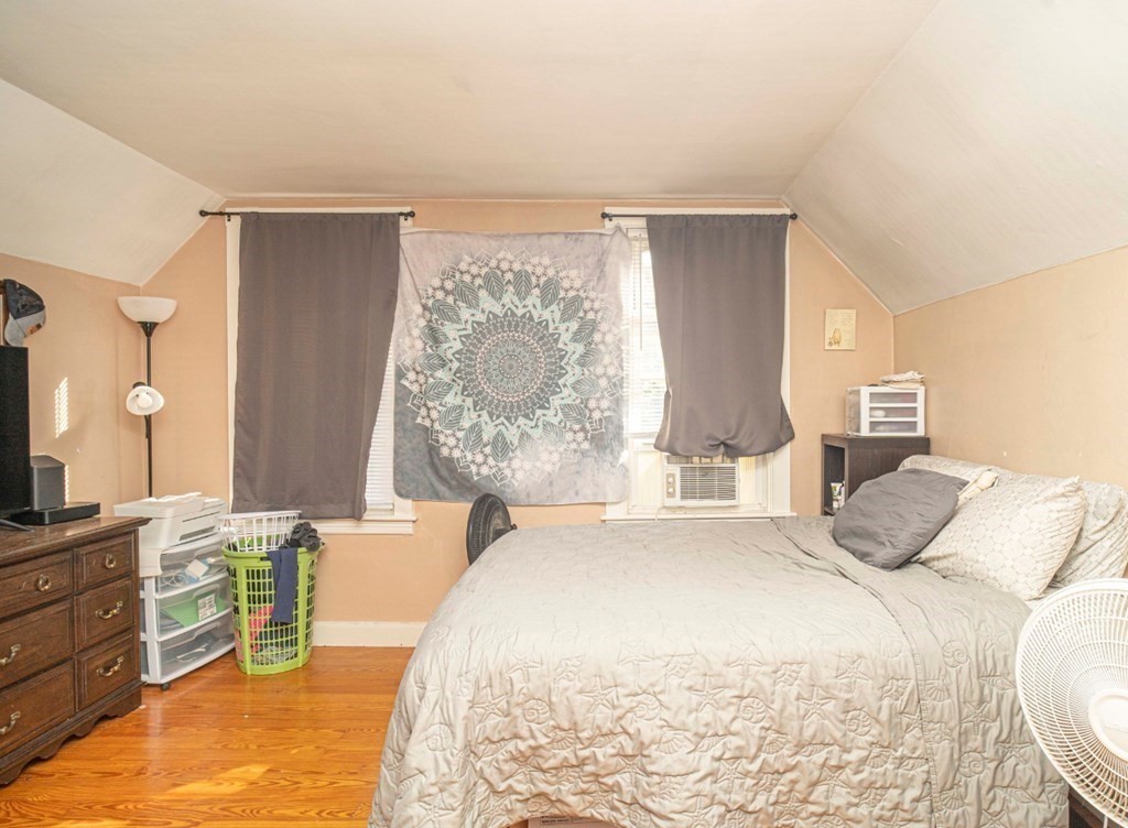 5 Exeter Street Taunton, MA 02780 - Photo 15 of 32 a bedroom with a bed and a dresser