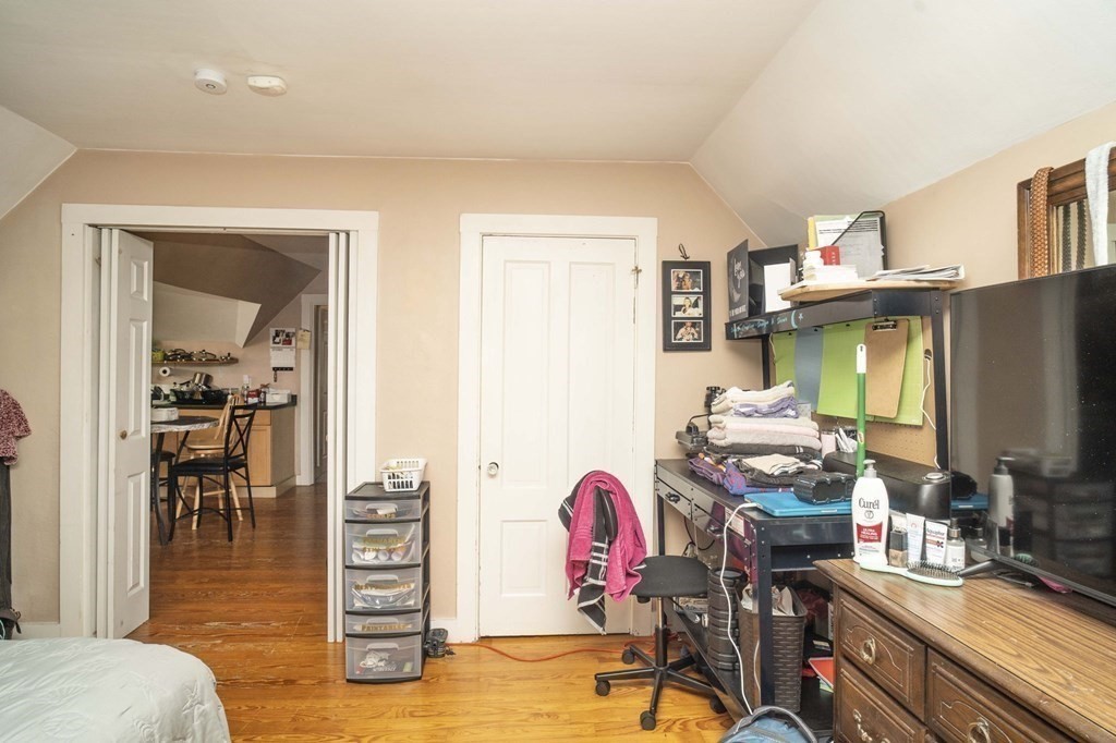 5 Exeter Street Taunton, MA 02780 - Photo 16 of 32 a view of a workspace with furniture and a livingroom