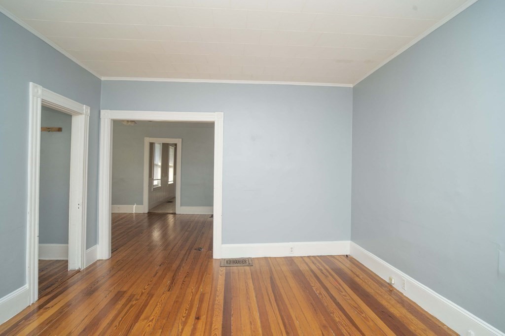 5 Exeter Street Taunton, MA 02780 - Photo 23 of 32 a view of a hallway with wooden floor