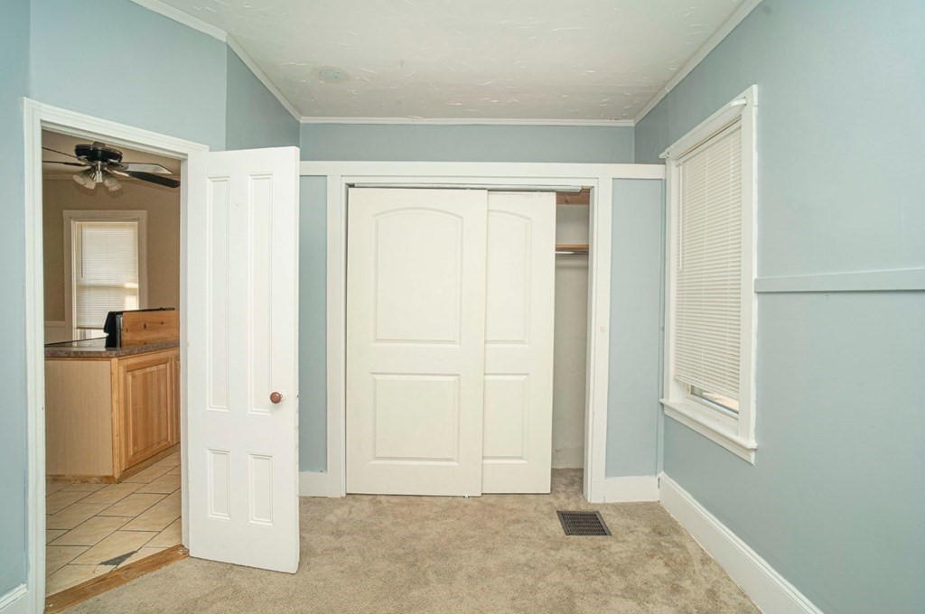 5 Exeter Street Taunton, MA 02780 - Photo 24 of 32 an empty room with a door