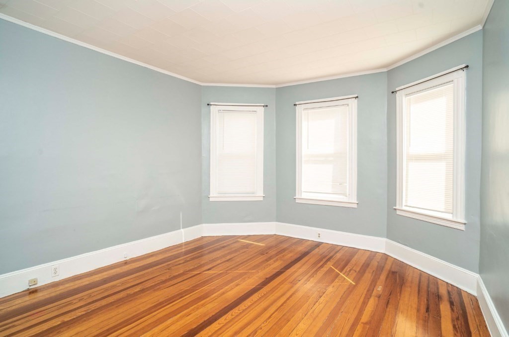 5 Exeter Street Taunton, MA 02780 - Photo 25 of 32 a view of a room with wooden floor and window