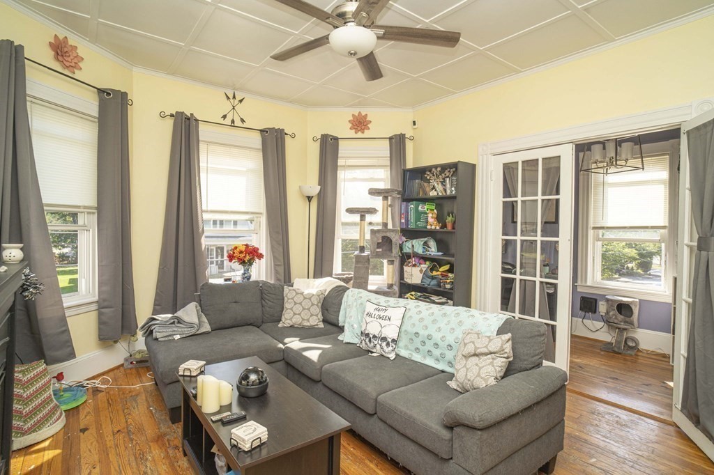 5 Exeter Street Taunton, MA 02780 - Photo 10 of 32 a living room with furniture and a large window