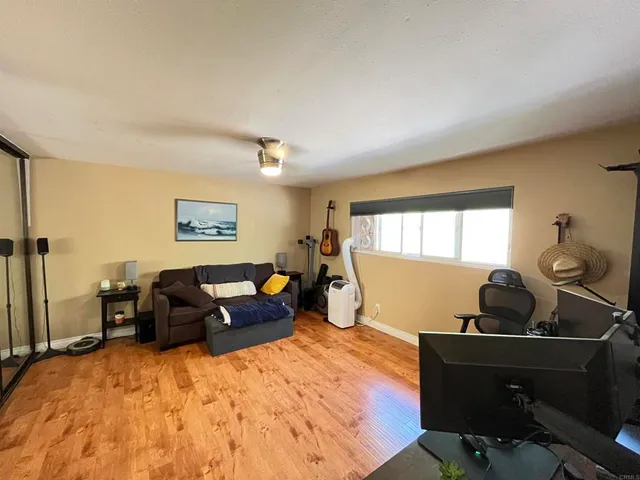 a bed room with a bed and a dresser