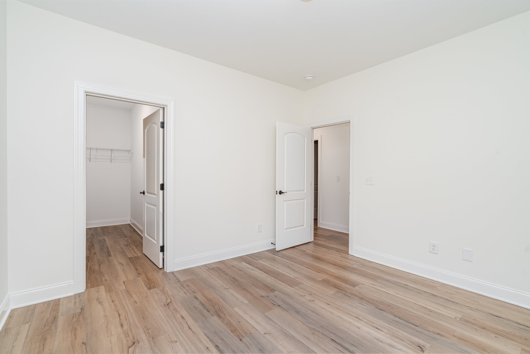 412 West Foxrun Springfield, TN 37172 - Photo 16 of 23 an empty room with wooden floor and closet