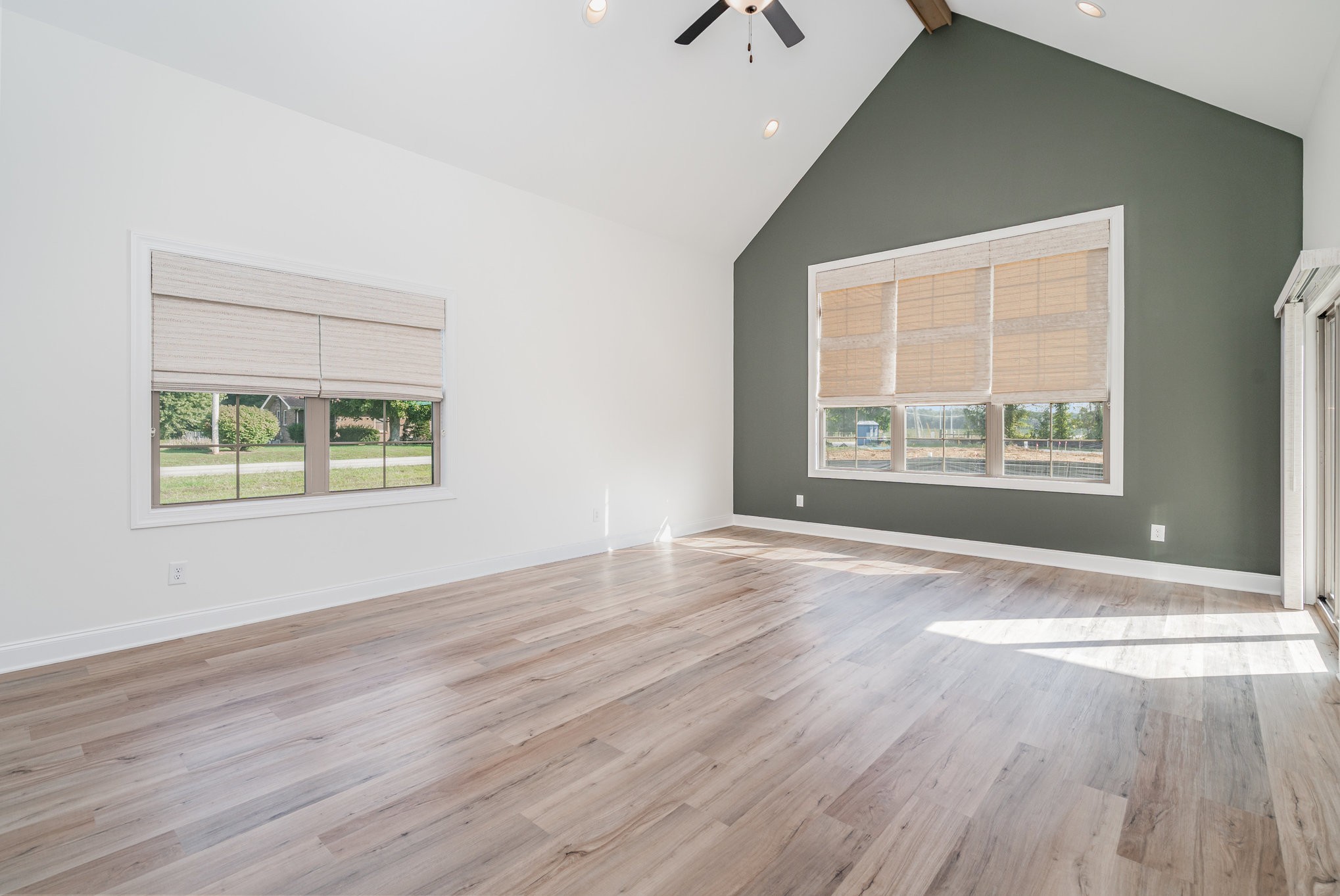 412 West Foxrun Springfield, TN 37172 - Photo 3 of 23 a view of an empty room with wooden floor and a window