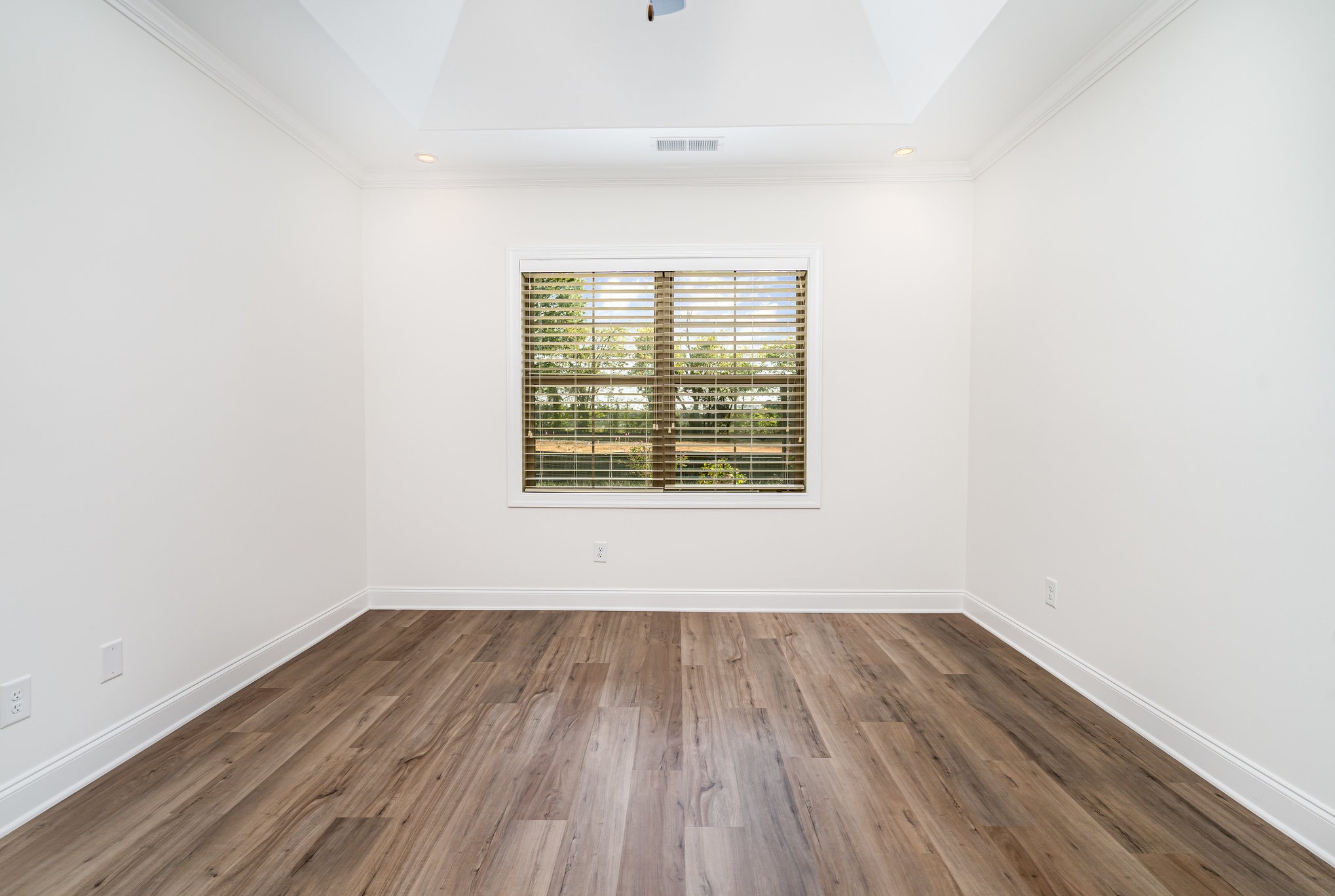 412 West Foxrun Springfield, TN 37172 - Photo 10 of 23 an empty room with wooden floor and windows
