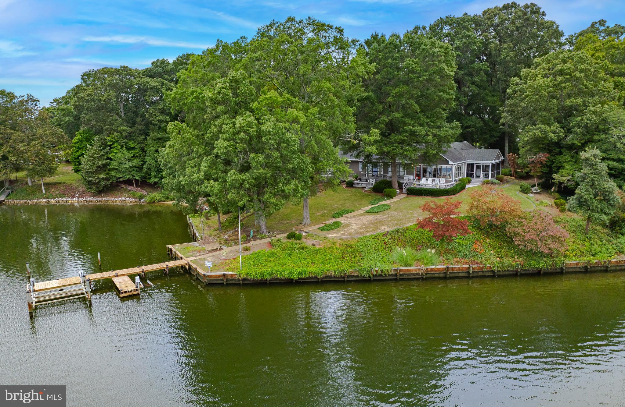 44973 Smiths Nursery Road Hollywood, MD 20636 - Photo 2 of 111 a view of a lake with a house in the background