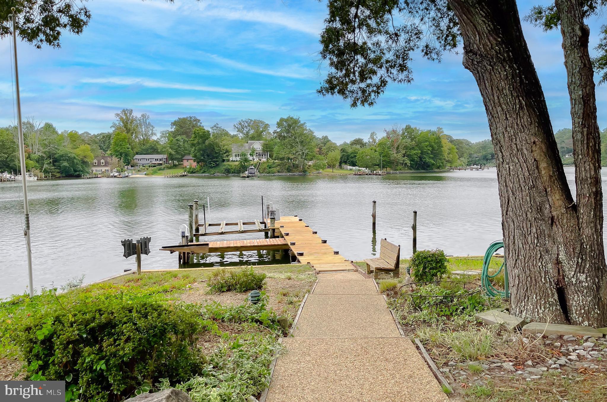 44973 Smiths Nursery Road Hollywood, MD 20636 - Photo 31 of 111 a view of a lake with a mountain in the background