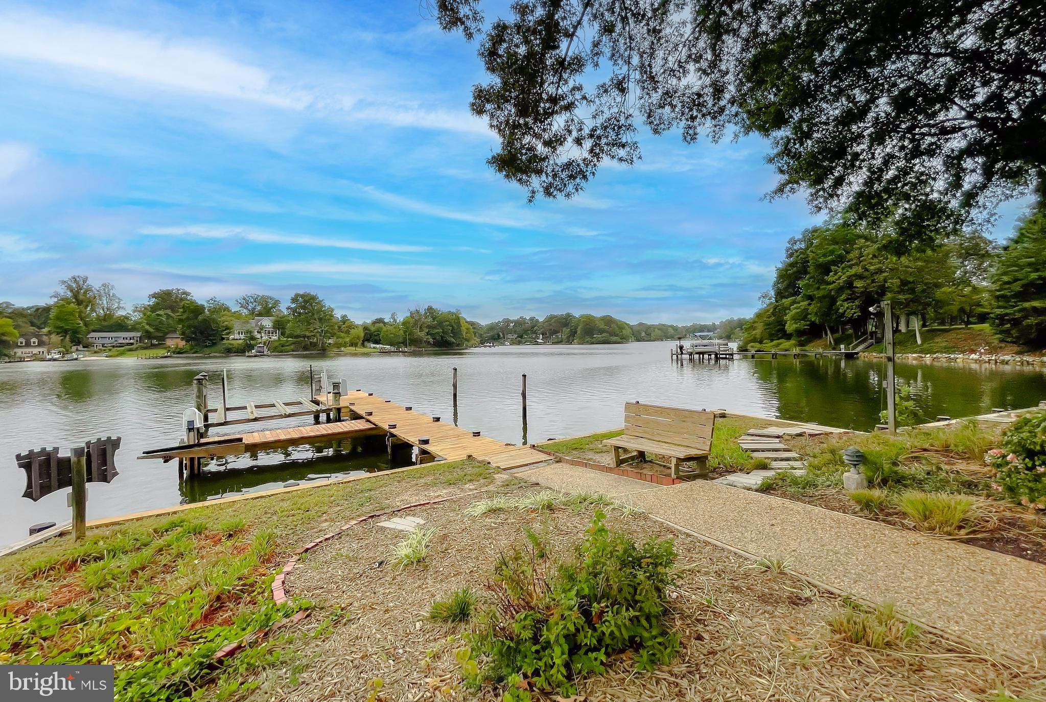 44973 Smiths Nursery Road Hollywood, MD 20636 - Photo 32 of 111 a view of a lake with houses in the back