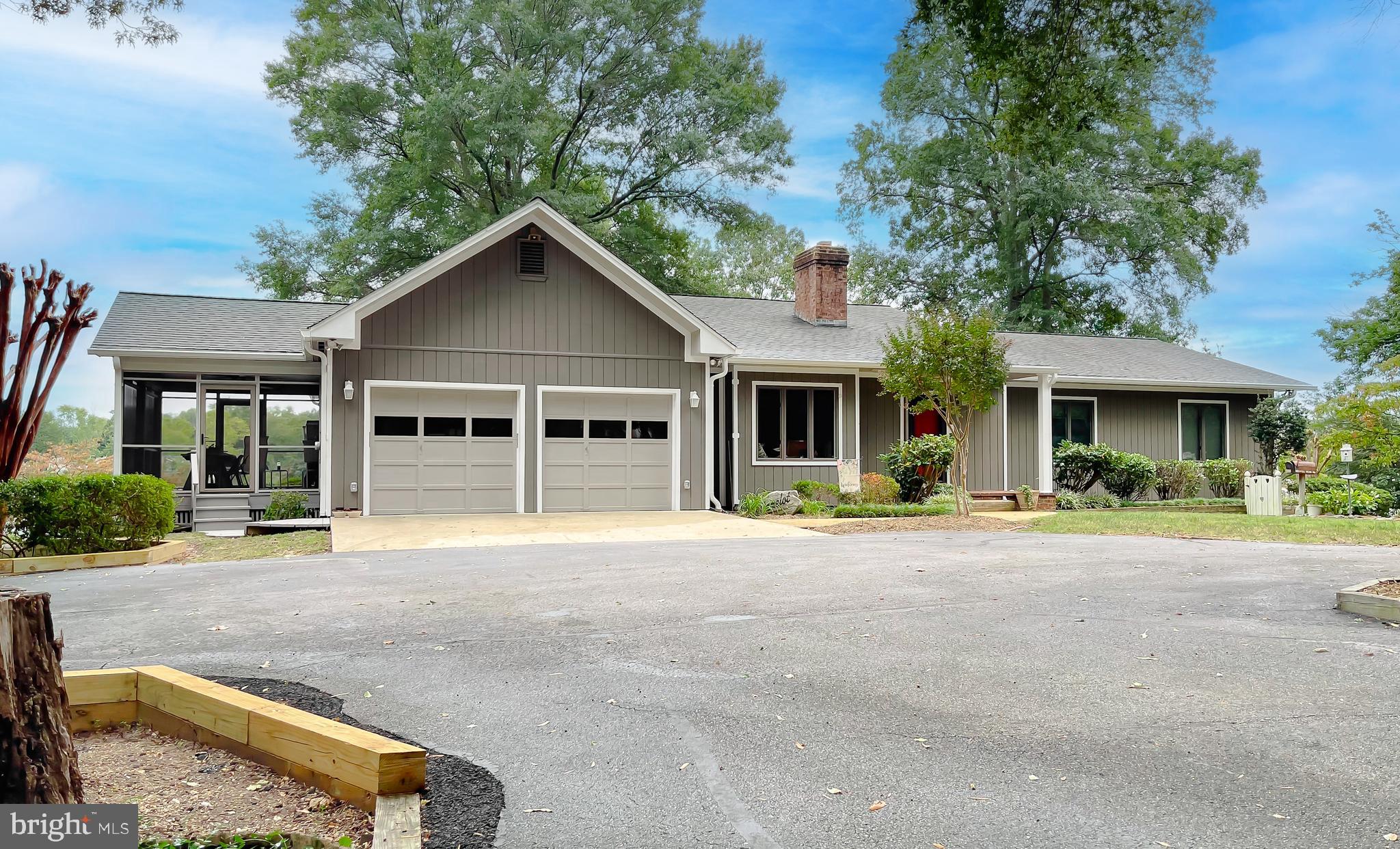 44973 Smiths Nursery Road Hollywood, MD 20636 - Photo 52 of 111 a front view of a house with a yard and porch