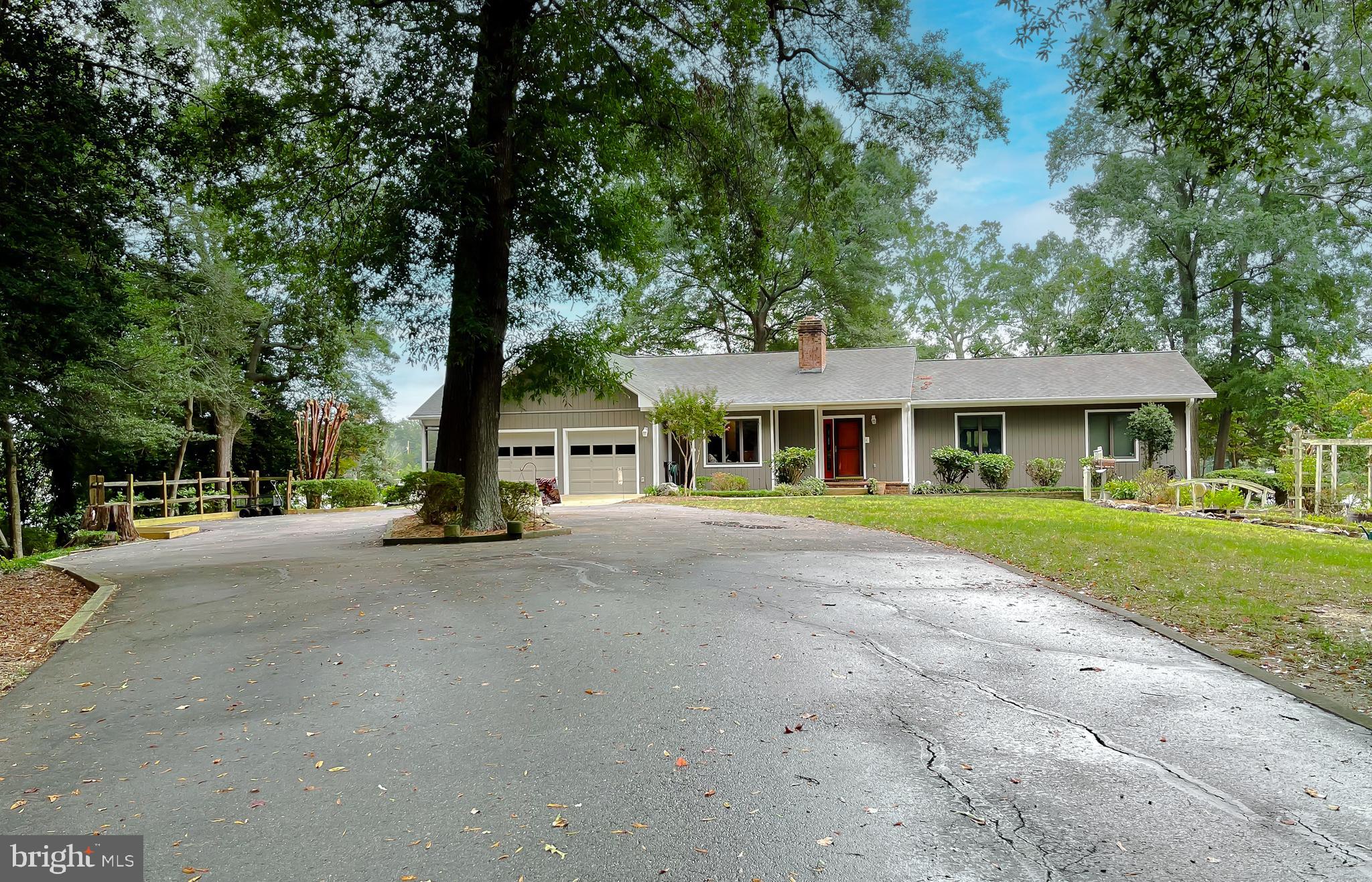 44973 Smiths Nursery Road Hollywood, MD 20636 - Photo 53 of 111 a front view of a house with a yard