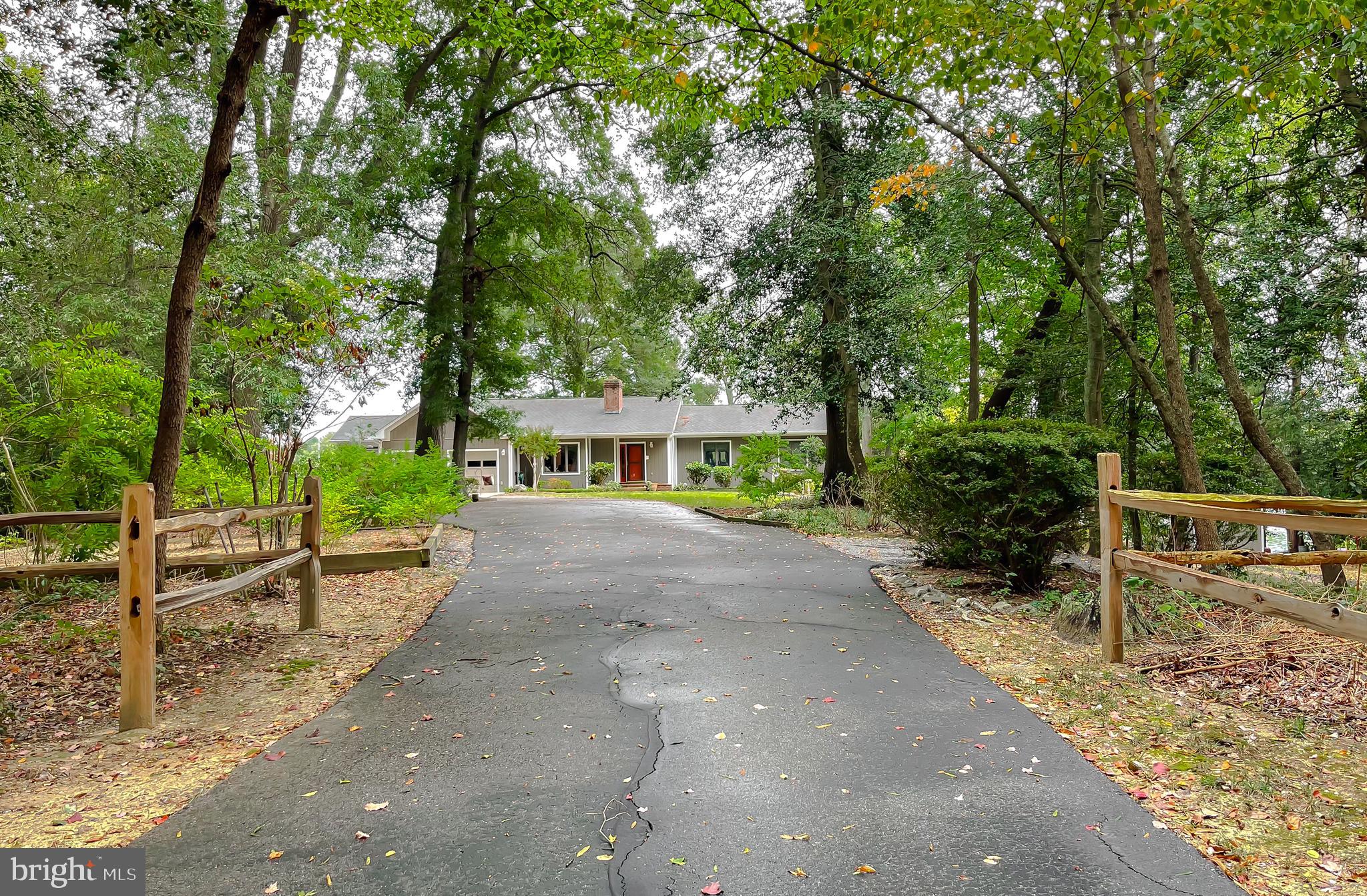 44973 Smiths Nursery Road Hollywood, MD 20636 - Photo 54 of 111 a front view of a house with a garden