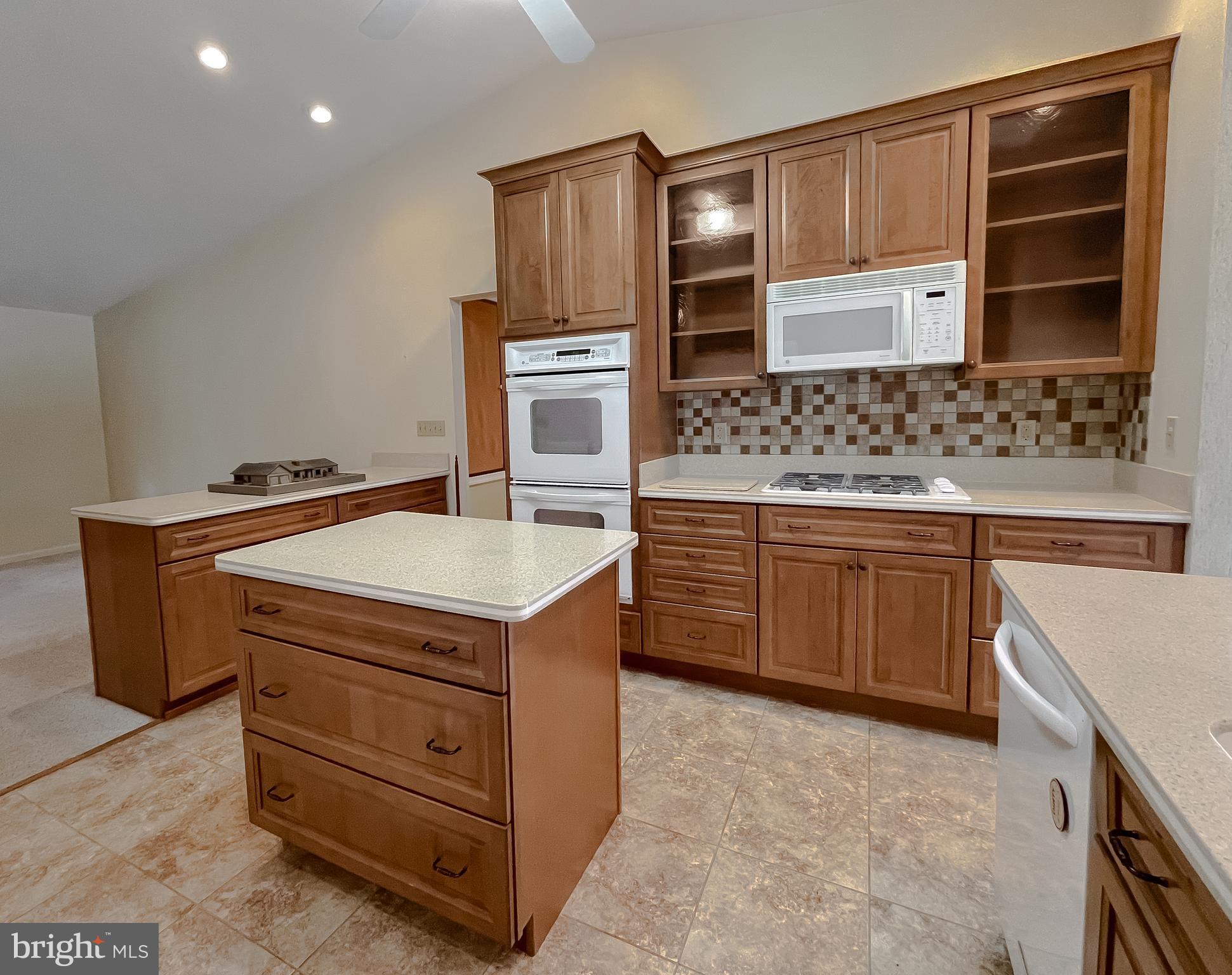 44973 Smiths Nursery Road Hollywood, MD 20636 - Photo 75 of 111 a kitchen with a stove and a microwave