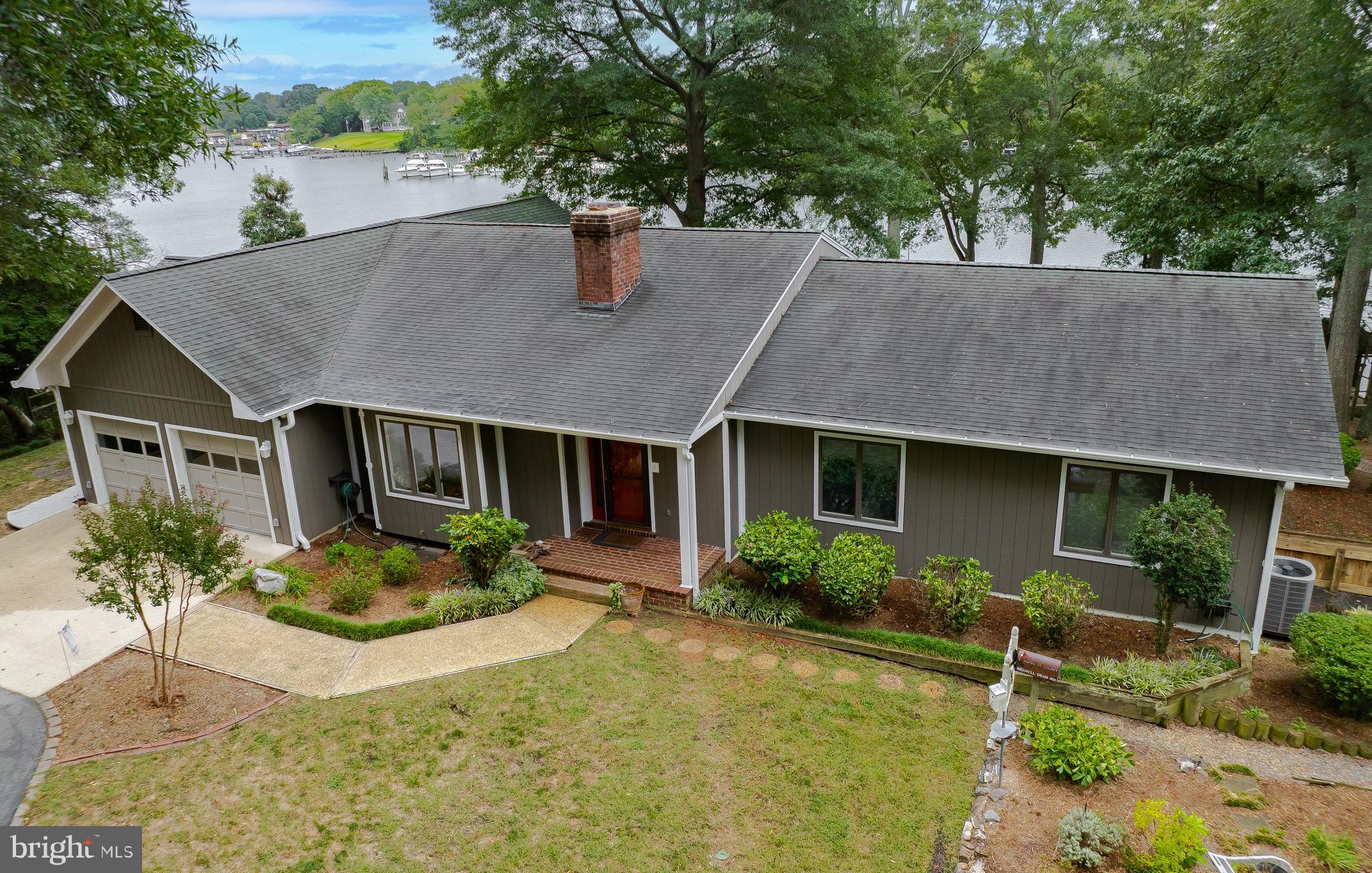 44973 Smiths Nursery Road Hollywood, MD 20636 - Photo 8 of 111 a front view of house and yard with seating space