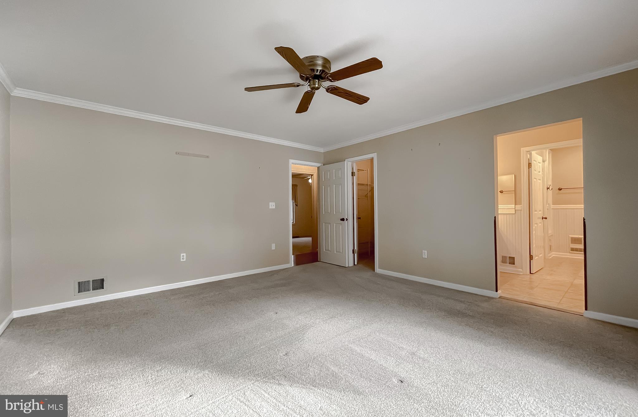 44973 Smiths Nursery Road Hollywood, MD 20636 - Photo 96 of 111 a view of a livingroom with a ceiling fan and wooden floor