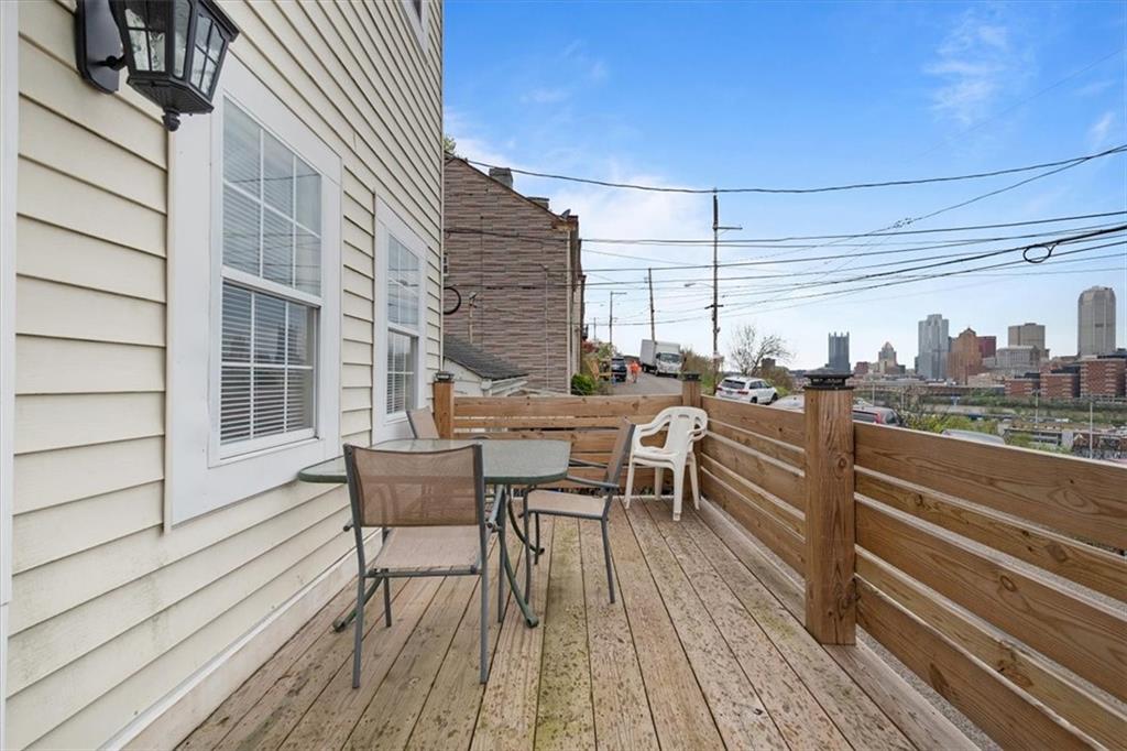 852 Windom Street Pittsburgh, PA 15203 - Photo 12 of 44 a roof deck view with a table and chairs