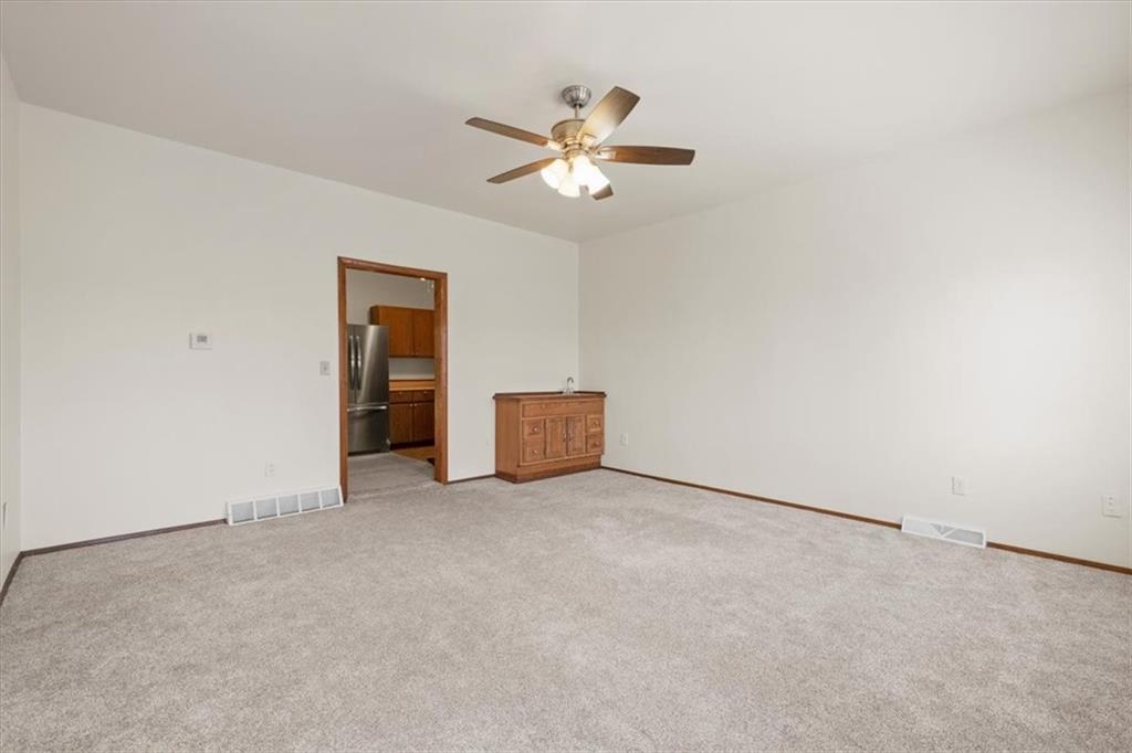 852 Windom Street Pittsburgh, PA 15203 - Photo 13 of 44 a view of a livingroom with a ceiling fan and window