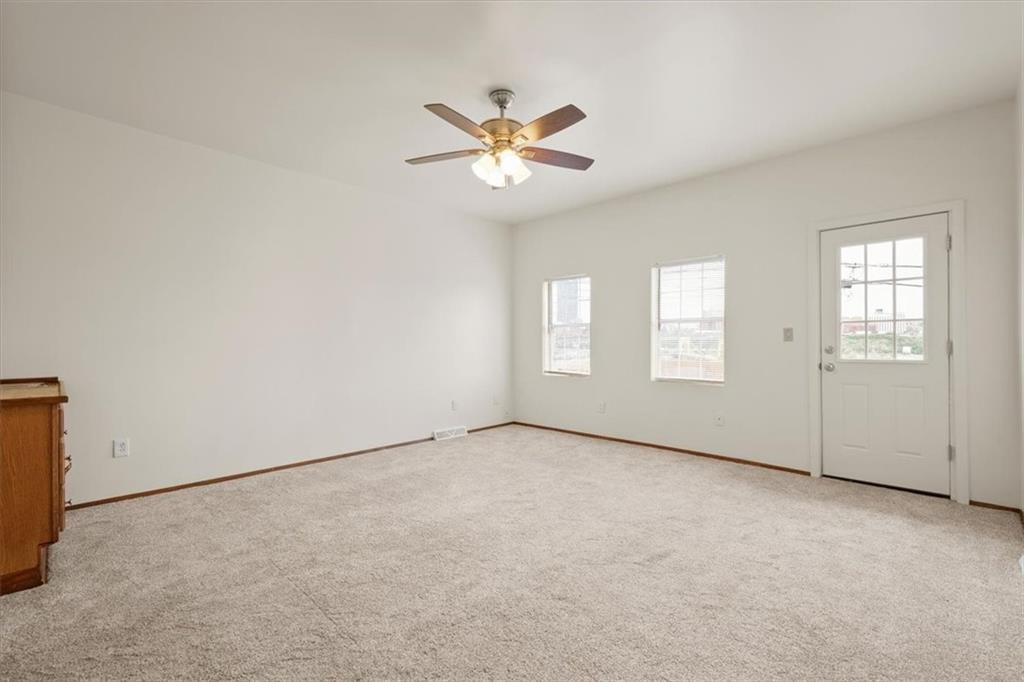852 Windom Street Pittsburgh, PA 15203 - Photo 16 of 44 an empty room with windows and fan