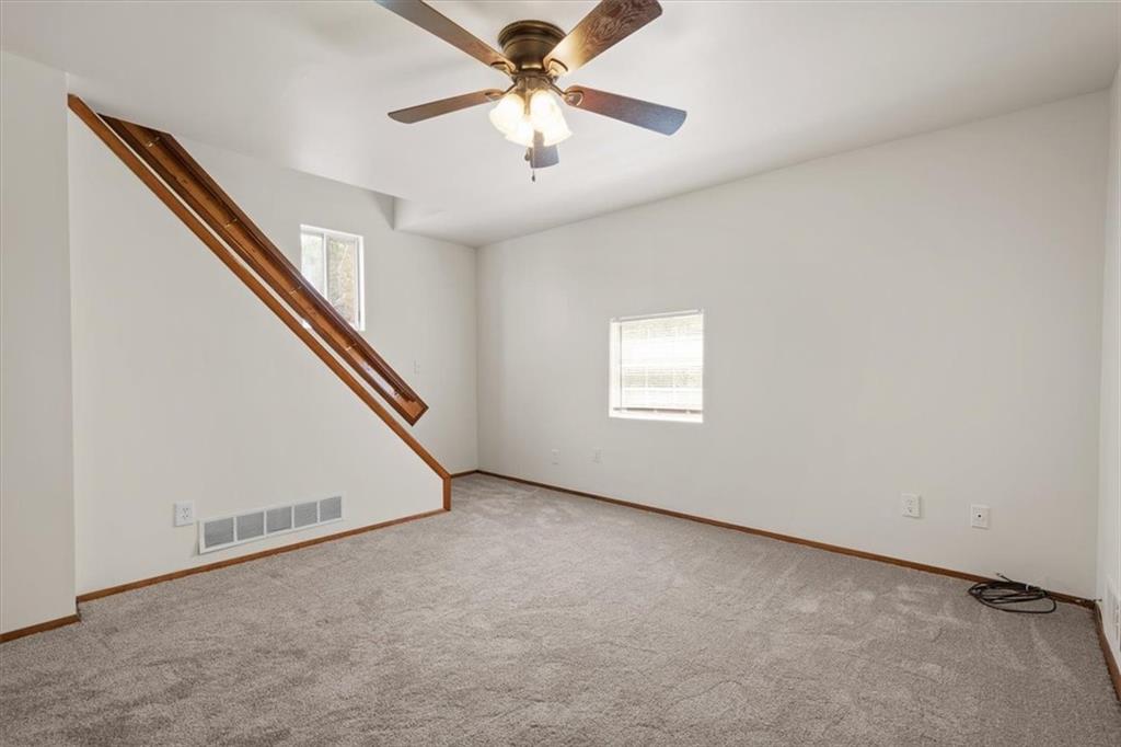852 Windom Street Pittsburgh, PA 15203 - Photo 25 of 44 an empty room with windows and fan