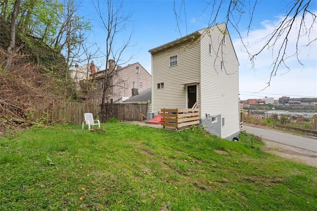852 Windom Street Pittsburgh, PA 15203 - Photo 3 of 44 a house view with a backyard space