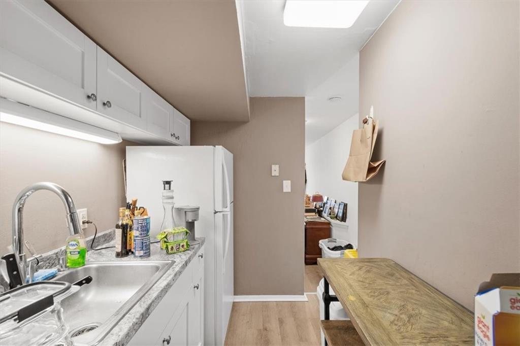 852 Windom Street Pittsburgh, PA 15203 - Photo 38 of 44 a kitchen with a refrigerator and a sink