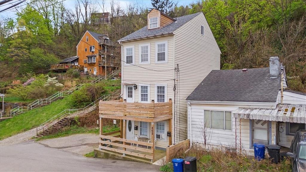 852 Windom Street Pittsburgh, PA 15203 - Photo 5 of 44 a aerial view of a house with yard and green space