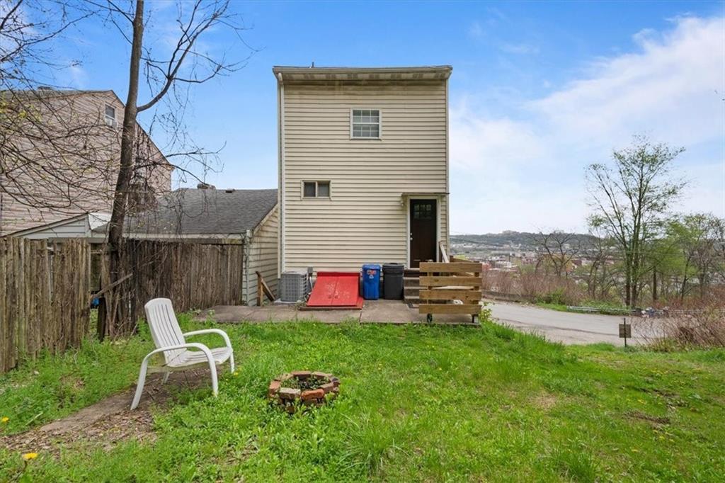852 Windom Street Pittsburgh, PA 15203 - Photo 7 of 44 a view of a backyard with furniture and a garden