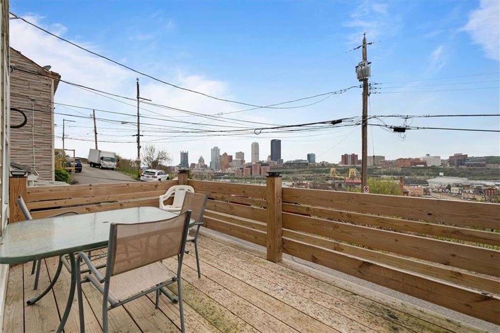852 Windom Street Pittsburgh, PA 15203 - Photo 10 of 44 a view of a balcony with table and chairs