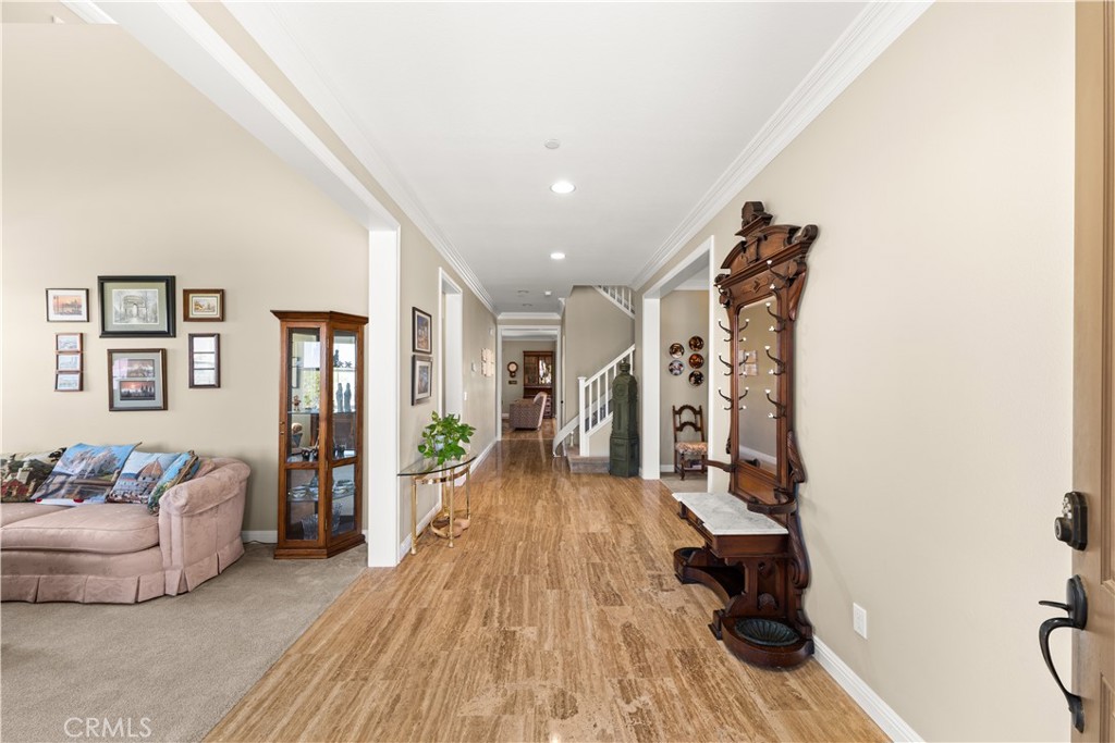 4976 Golden Ridge Place Rancho Cucamonga, CA 91739 - Photo 4 of 56 Travertine tile floors in Foyer