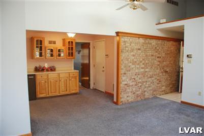 2710 Woodside Road Bethlehem, PA 18017 - Photo 7 of 24 View from family room into dinette area - Exposed brick wall