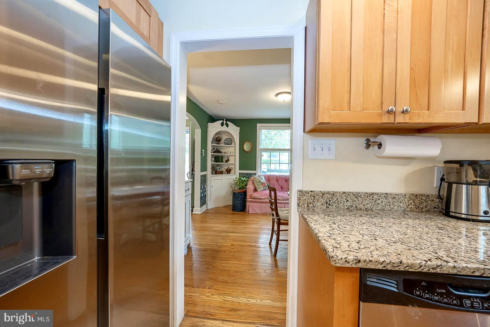 305 Eagle Road Wayne, PA 19087 - Photo 11 of 43 a kitchen with counter top oven and cabinets