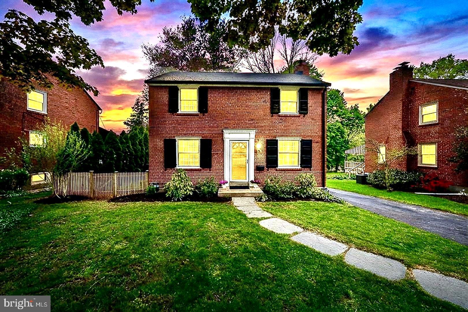 305 Eagle Road Wayne, PA 19087 - Photo 40 of 43 a view of a brick house with a yard and plants