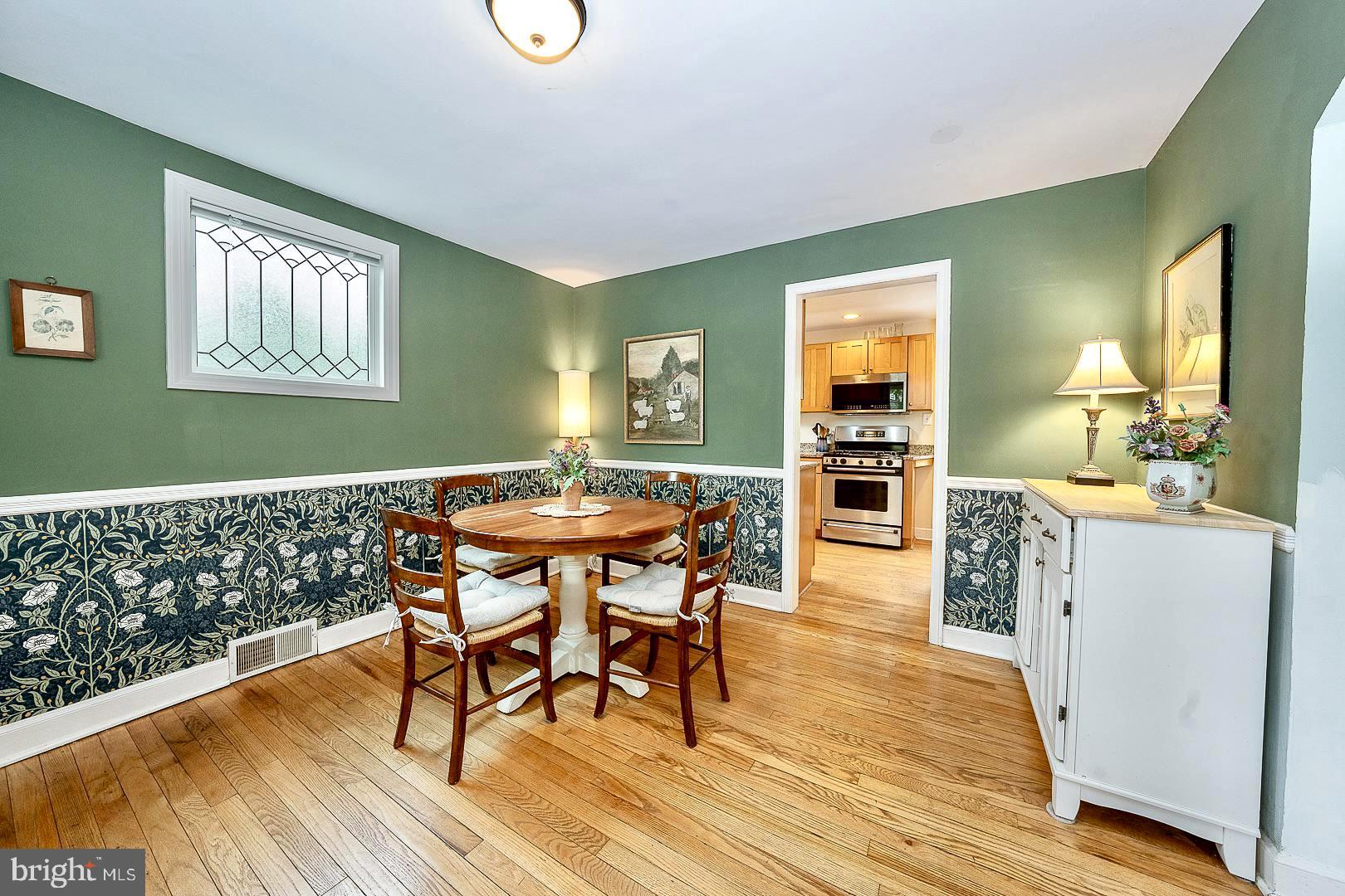 305 Eagle Road Wayne, PA 19087 - Photo 10 of 43 a view of a dining room with furniture and wooden floor