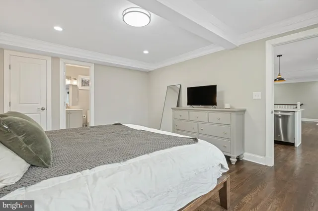 a bathroom with a sink vanity and a mirror