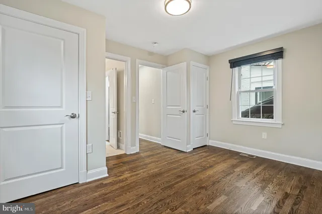 a workspace with furniture and wooden floor