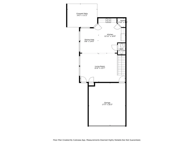 a picture of a bench in front of a building