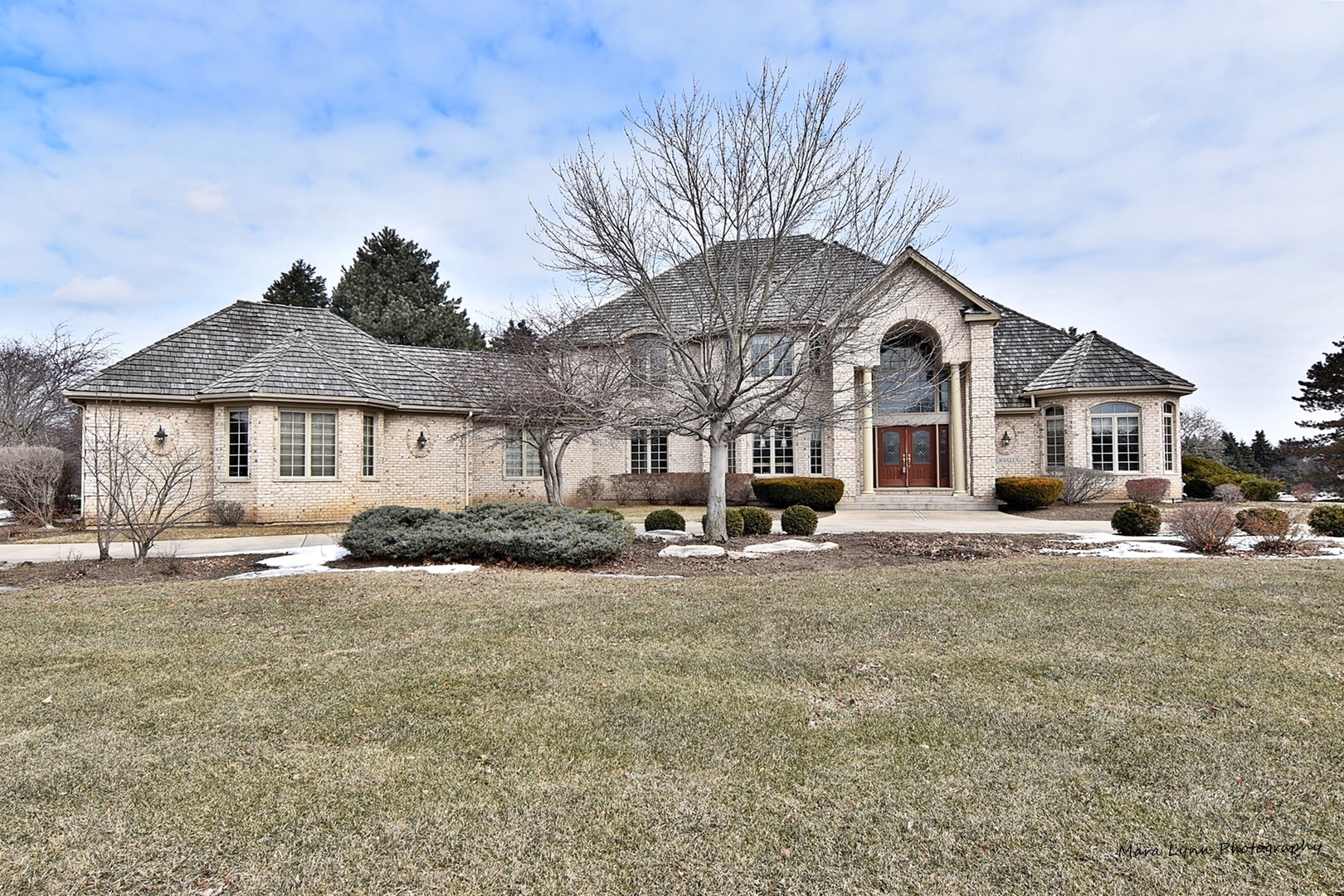 36W623 Lancaster Road St. Charles, IL 60175 - Photo 1 of 20 a front view of a house with a yard