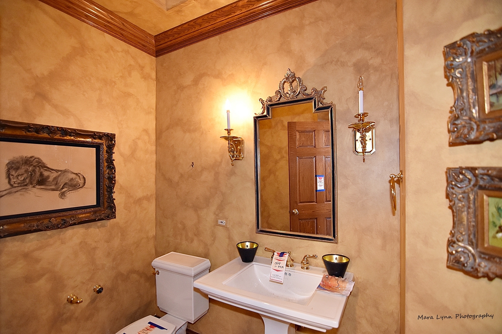 36W623 Lancaster Road St. Charles, IL 60175 - Photo 15 of 20 a bathroom with a sink and mirror with toilet