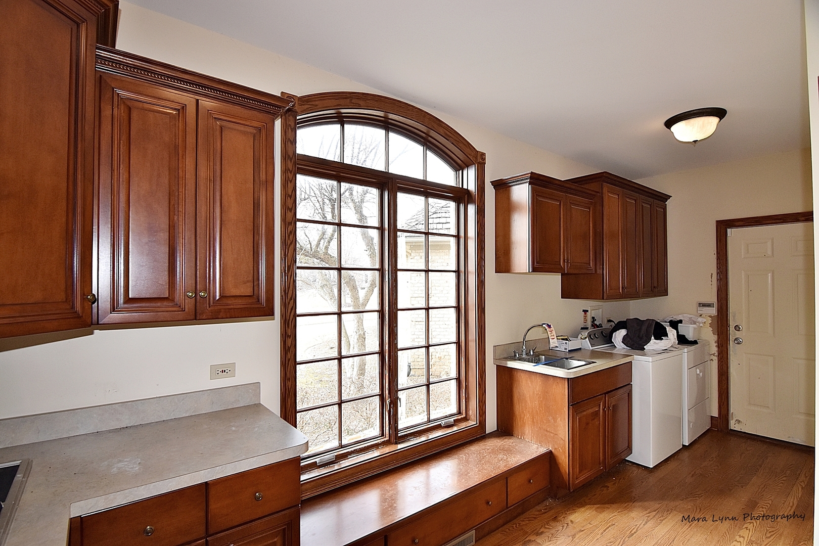 36W623 Lancaster Road St. Charles, IL 60175 - Photo 17 of 20 a kitchen with a window a sink and a microwave