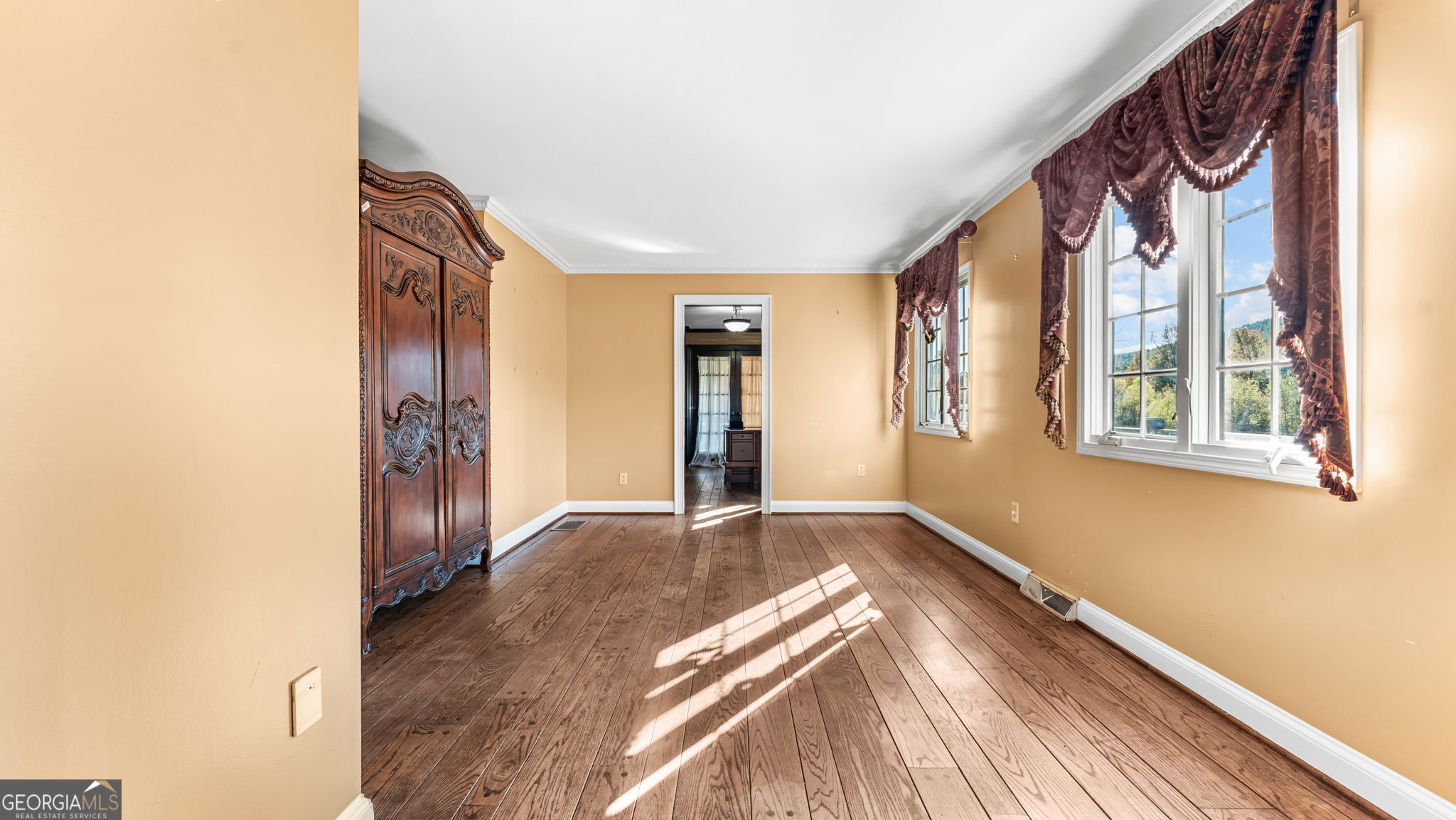 8876 Cave Springs Road Cave Spring, GA 30124 - Photo 12 of 36 a view of an empty room and window