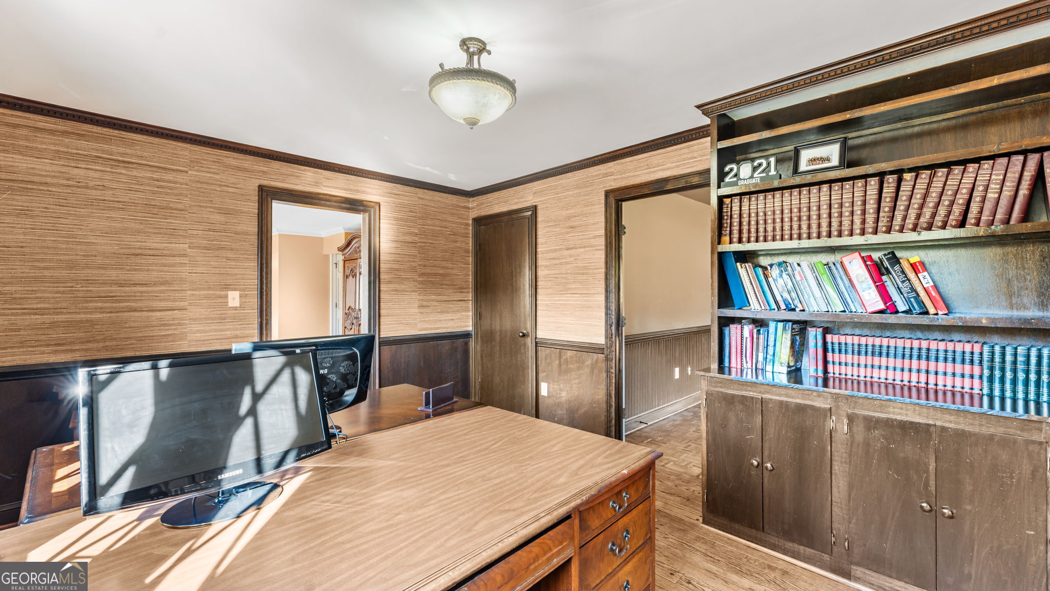 8876 Cave Springs Road Cave Spring, GA 30124 - Photo 15 of 36 a bedroom with a bed and a book shelf