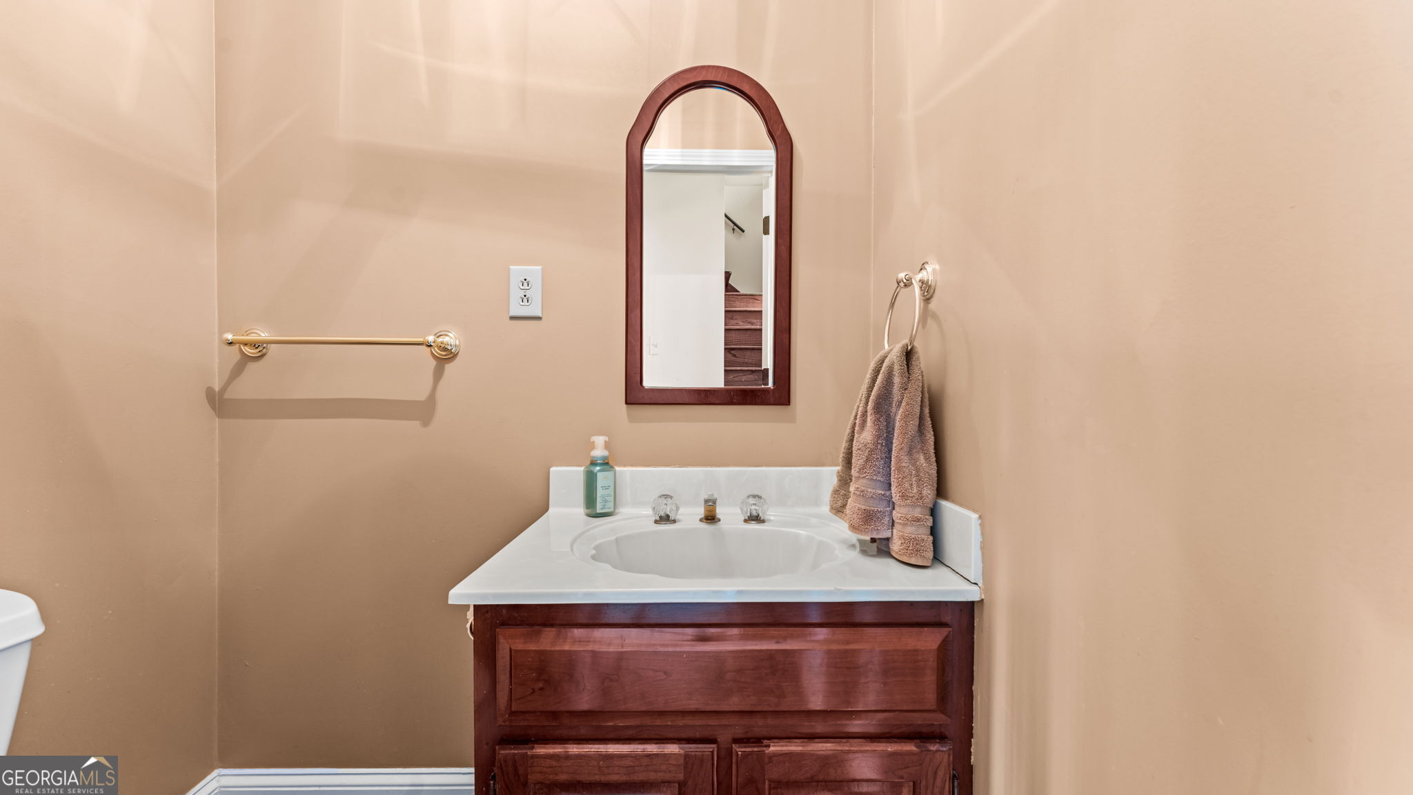 8876 Cave Springs Road Cave Spring, GA 30124 - Photo 18 of 36 a view of a bathroom with a sink and mirror