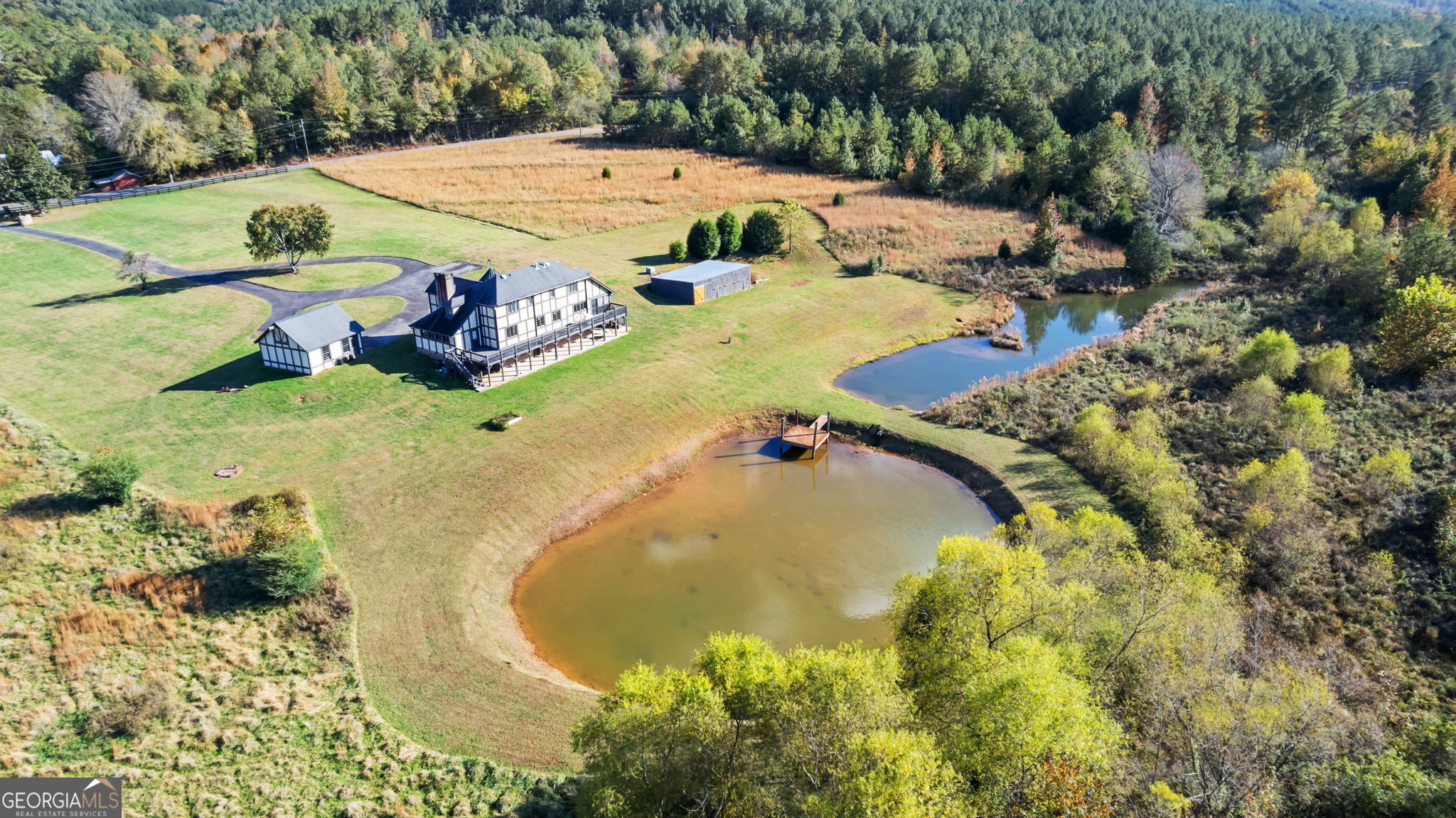 8876 Cave Springs Road Cave Spring, GA 30124 - Photo 32 of 36 a view of a swimming pool with a yard
